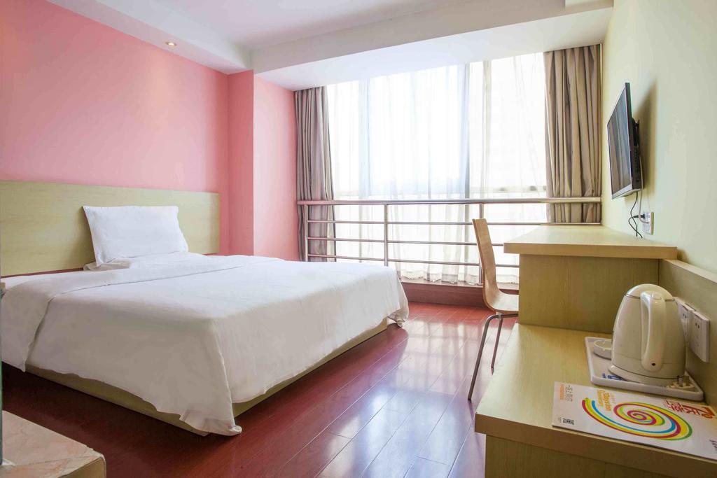 7Days Inn Guangzhou Xinshi Номер фото